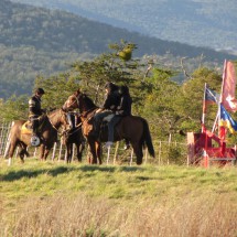 Horse riding with Gauchito Gil memorial